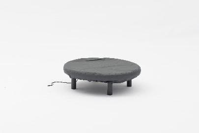 A gray protective cover is draped over an outdoor furniture piece, likely a table or seating arrangement, on a white background.